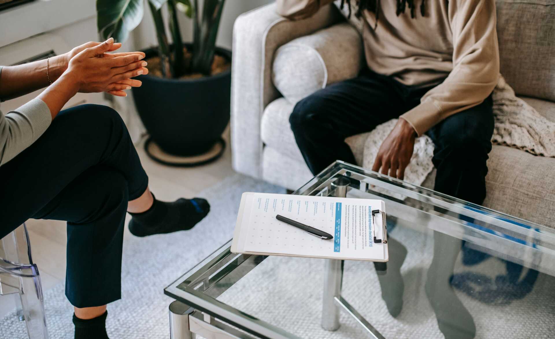 pexels alex green 5699418 A therapist conducting an intake session