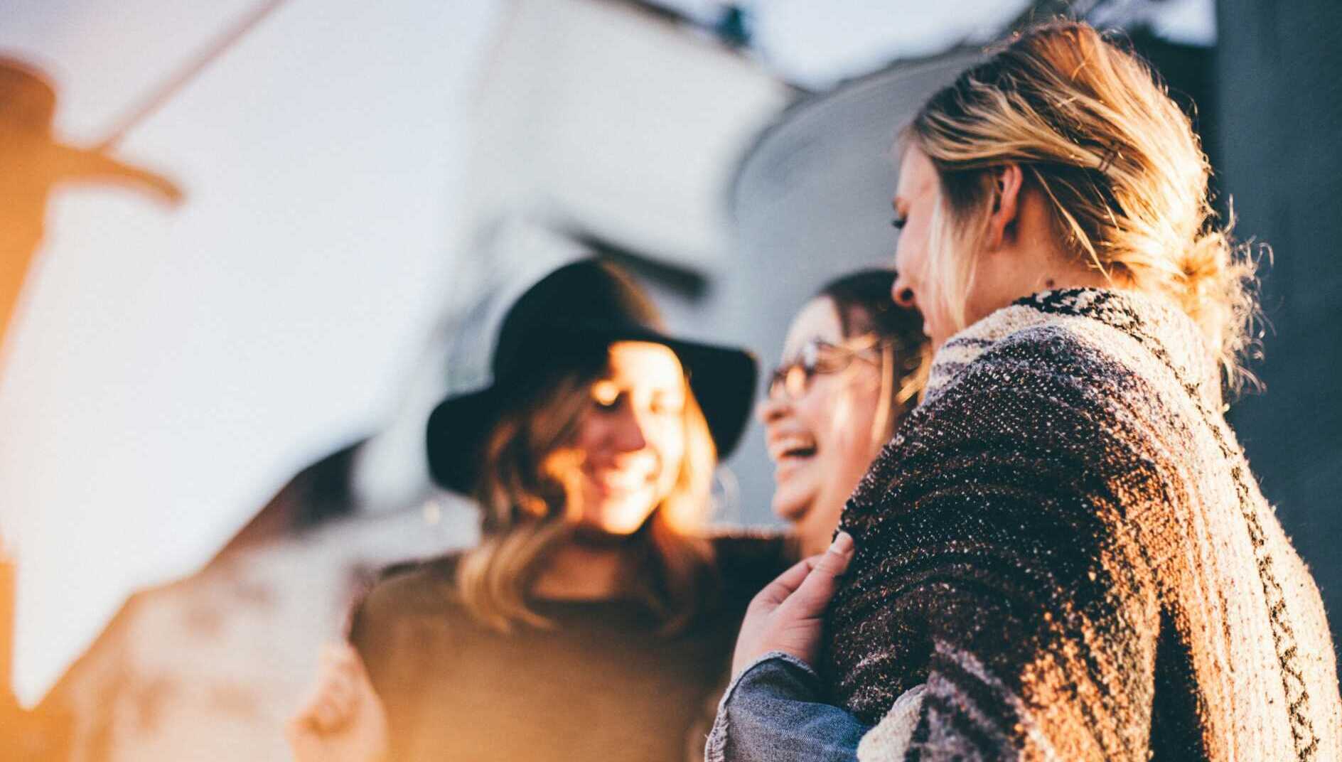 priscilla du preez nF8xhLMmg0c unsplash A group of women laughing