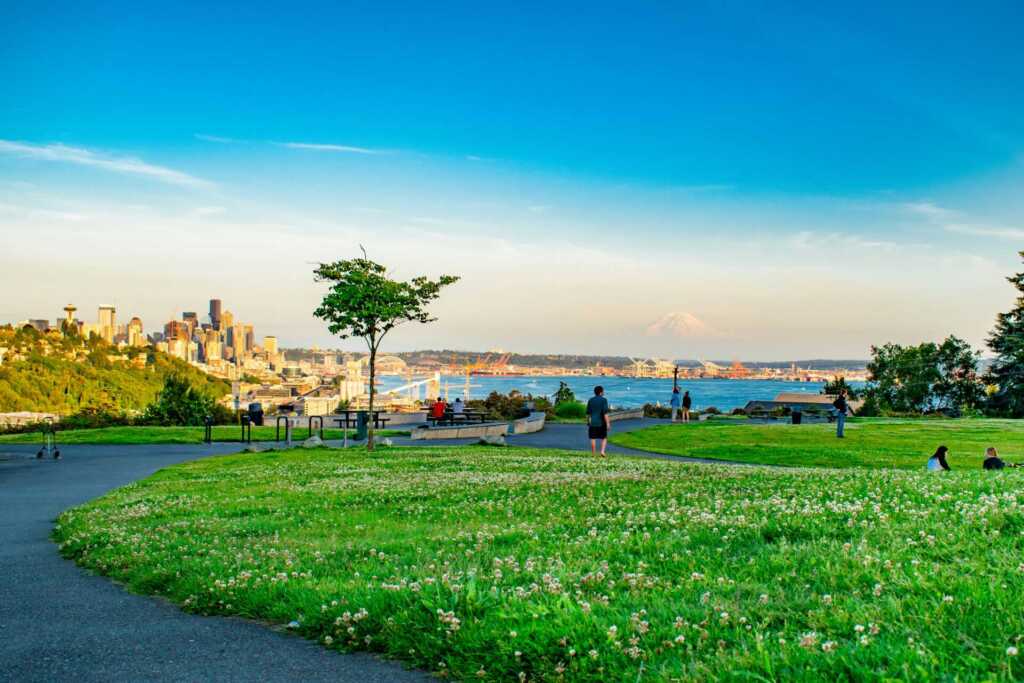 A view of Downtown Seattle, Puget Sound, and Mount Rainier as seen from Magnolia neighborhood in Seattle