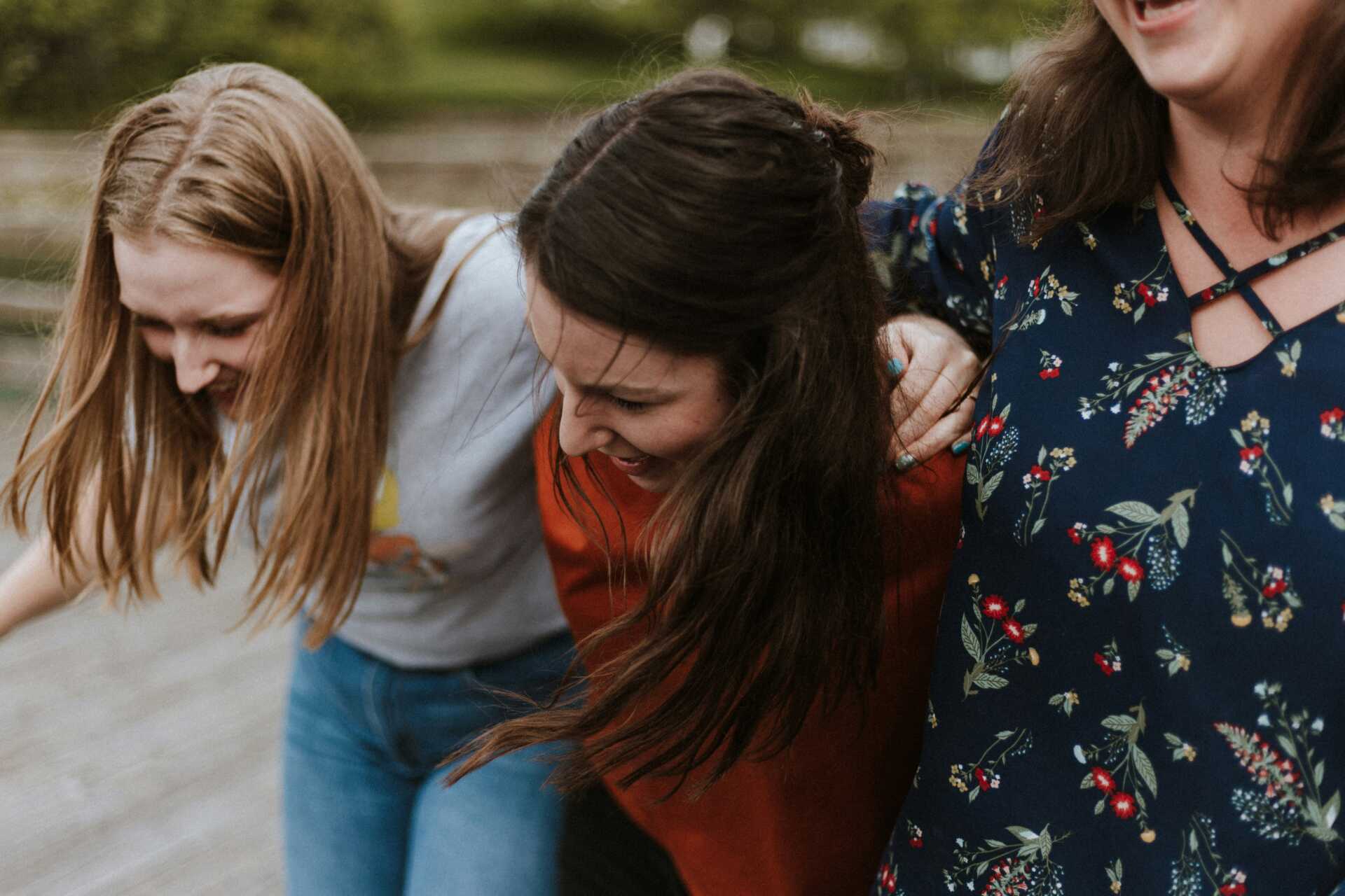 priscilla du preez WFBVn6fSgys unsplash Two teen girls and an adult woman laughing
