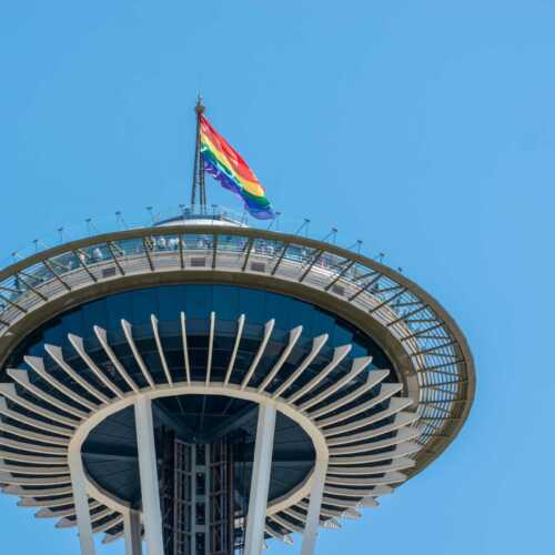 The Seattle Space Needle with a Pride flag on top